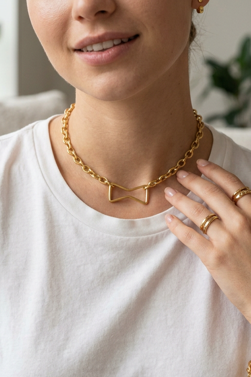 GOLD BOW TIE CHOKER