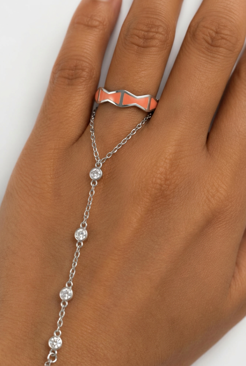 INFINITY BOW RING - CORAL